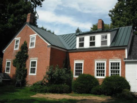 red metal roof on red brick house|roof colors for brick house.